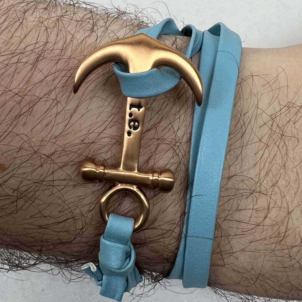 Men's light blue leather bracelet with gold anchor