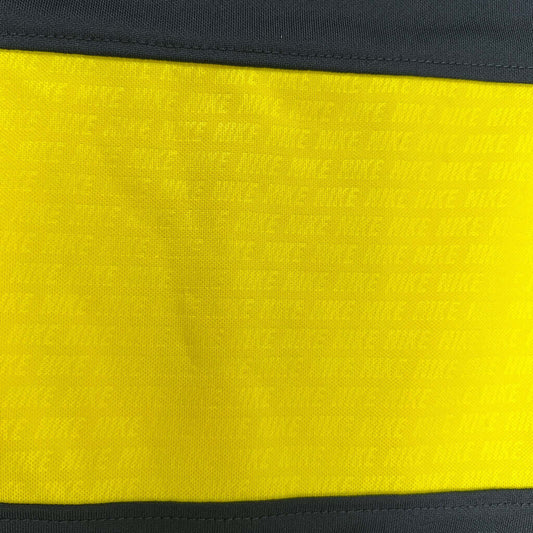 Boys Nike dri-fit top yellow detail