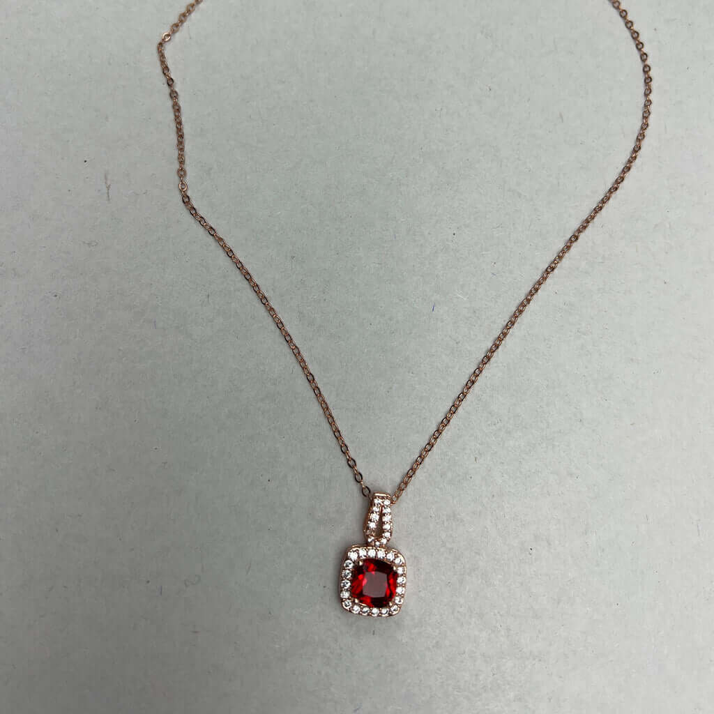 Gold chain red CZ stone