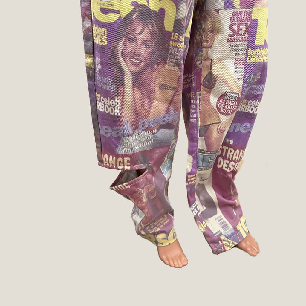 Oversized jeans with 90's magazine print Hem Detail