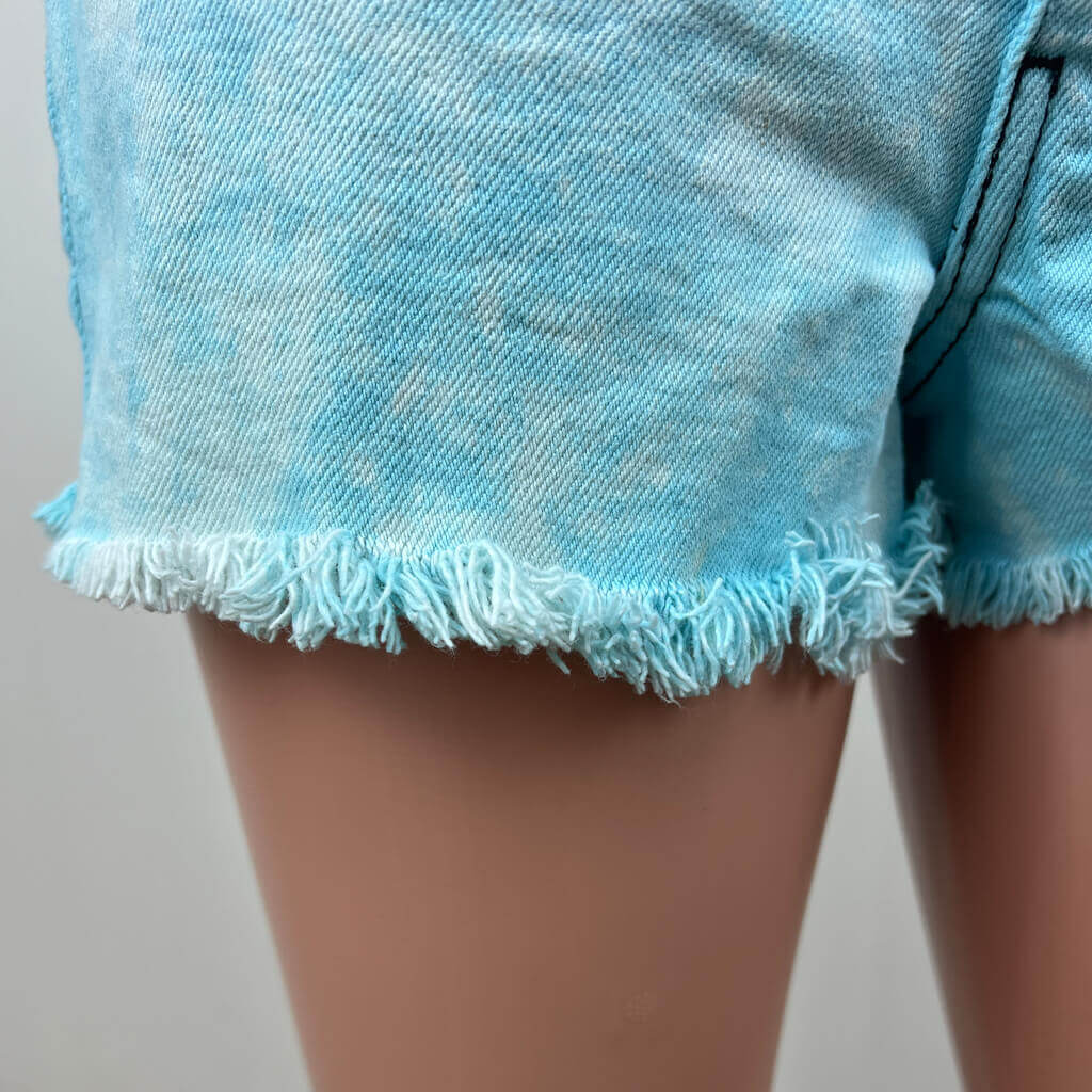 Stevie Blue Wash Denim Short front hem