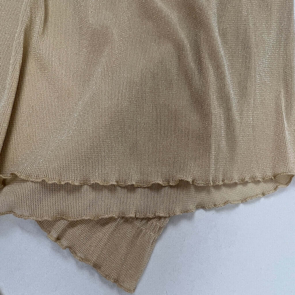 Valleygirl sheer metallic gold and cream womans top hem detail
