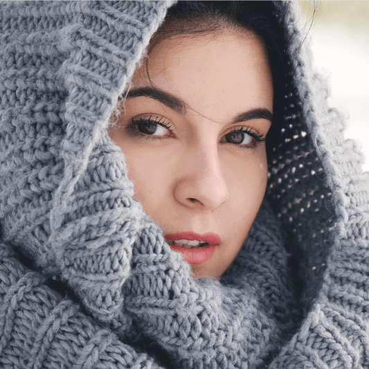 Woman's face with woollen hoodie