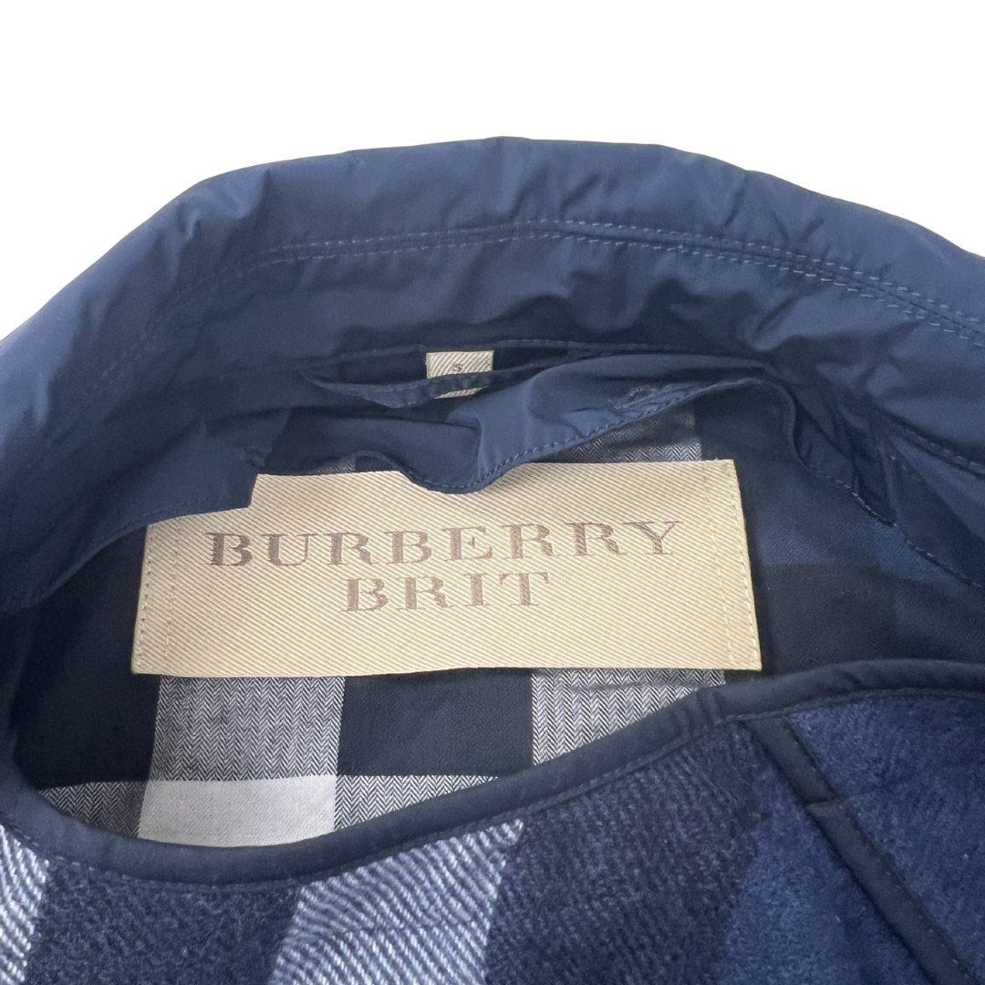 Front collar detail view of the Women's Burberry Brit Raincoat