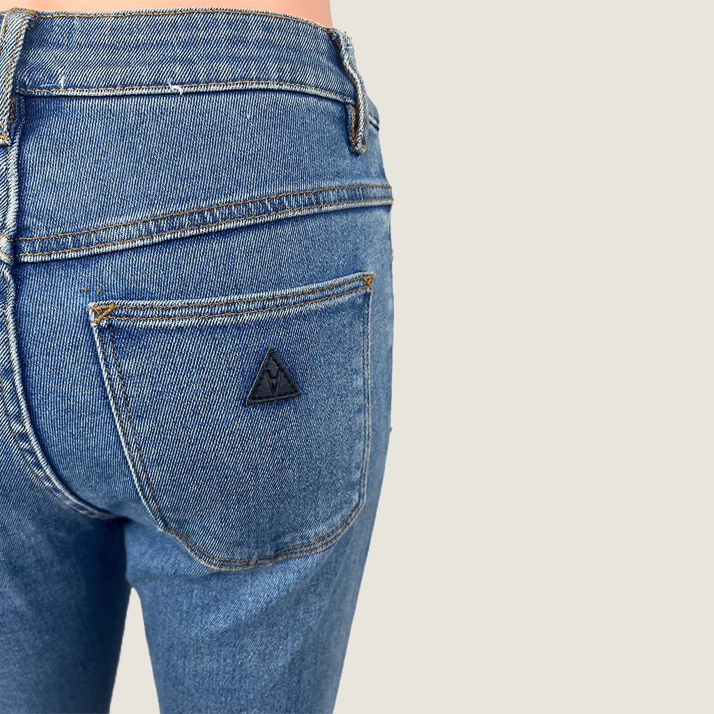 Back Close Up View of pocket of the Abrand Jeans High Skinny Ankle Basher Jeans