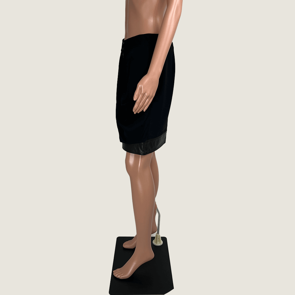 Side view of the Alexander Wang mini drape skirt