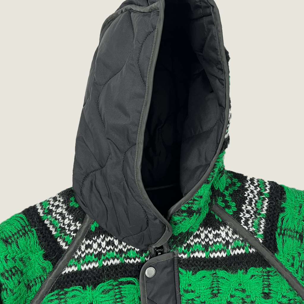 Front hood detail view of the Andersson Bell Unisex Nordic Knit Patch Quilted Parka