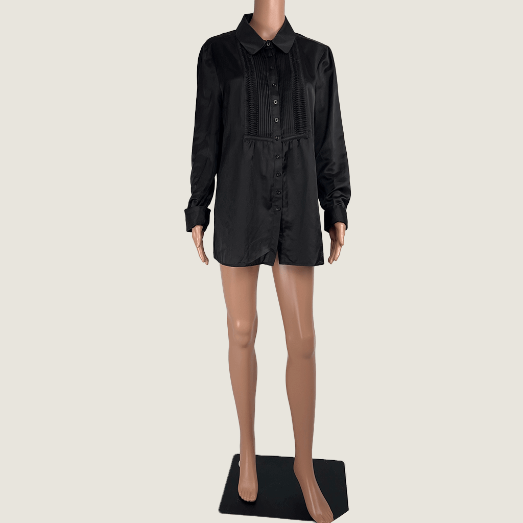 Front view of a black long sleeve shirt with a feature pleated block at front from Apanage