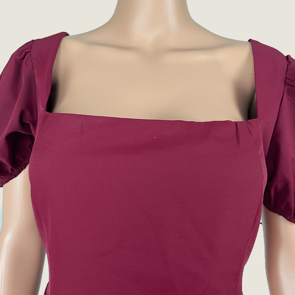 Front bust detail view of the Atmos&Here Burgundy Cap Sleeve Midi Dress