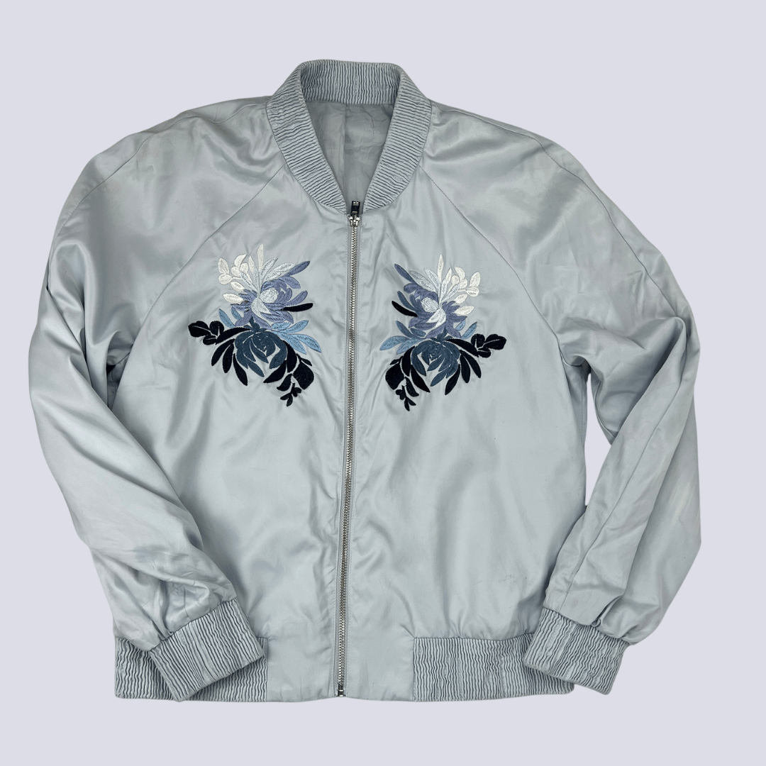 Front view of the baby blue satin bomber jacket