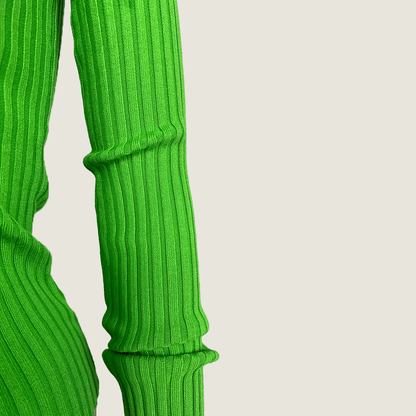 Close up view of the sleeve on the Bayse Luella green jumper