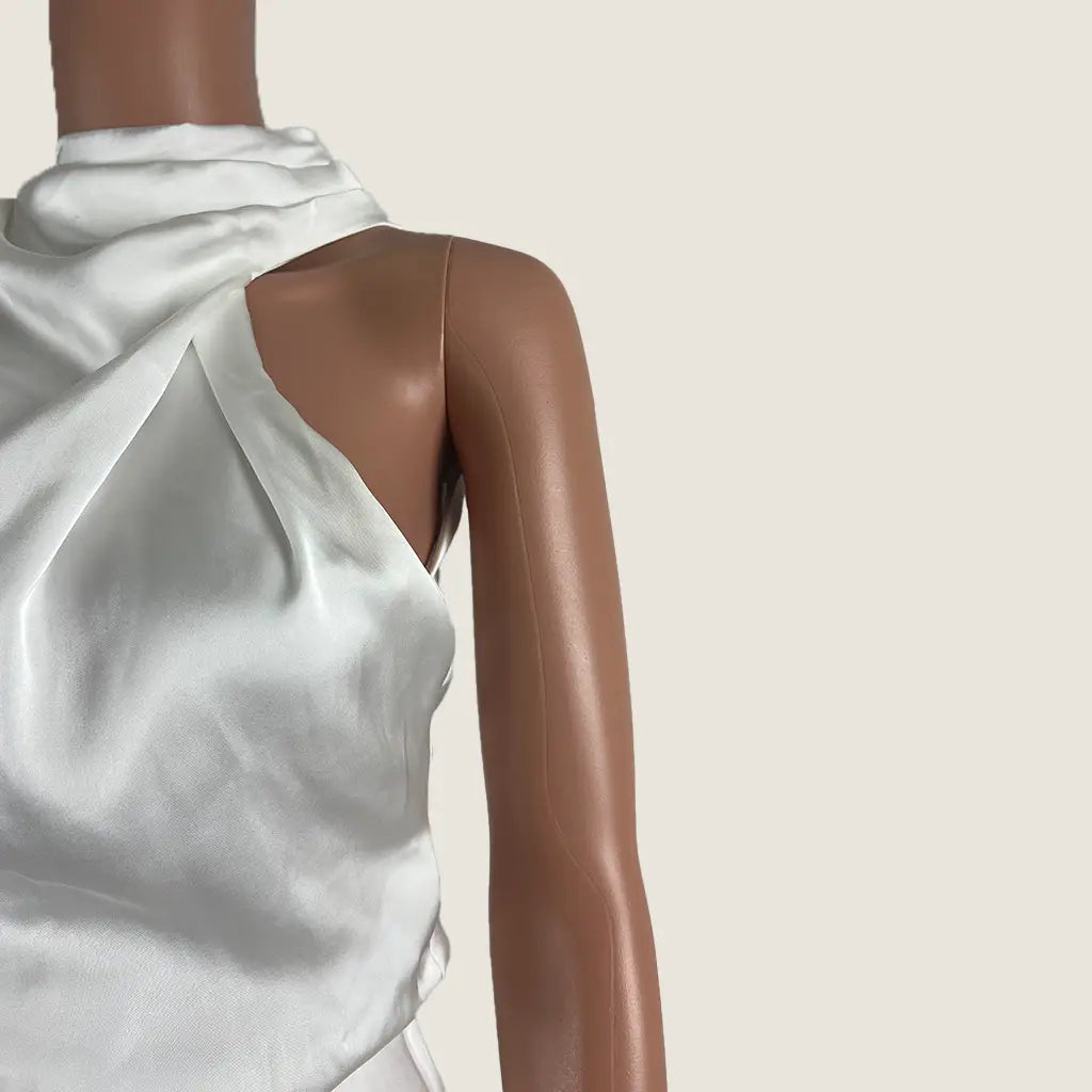 Side Detail View of the Burans Fashion White Sleeveless Dress