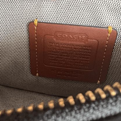 Close Up View of the Inner Stitched Label on the Coach Swinger 20 Shoulder Bag