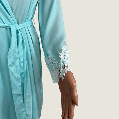 Front view of the sleeve and lace on the Cotton On Body aqua open robe