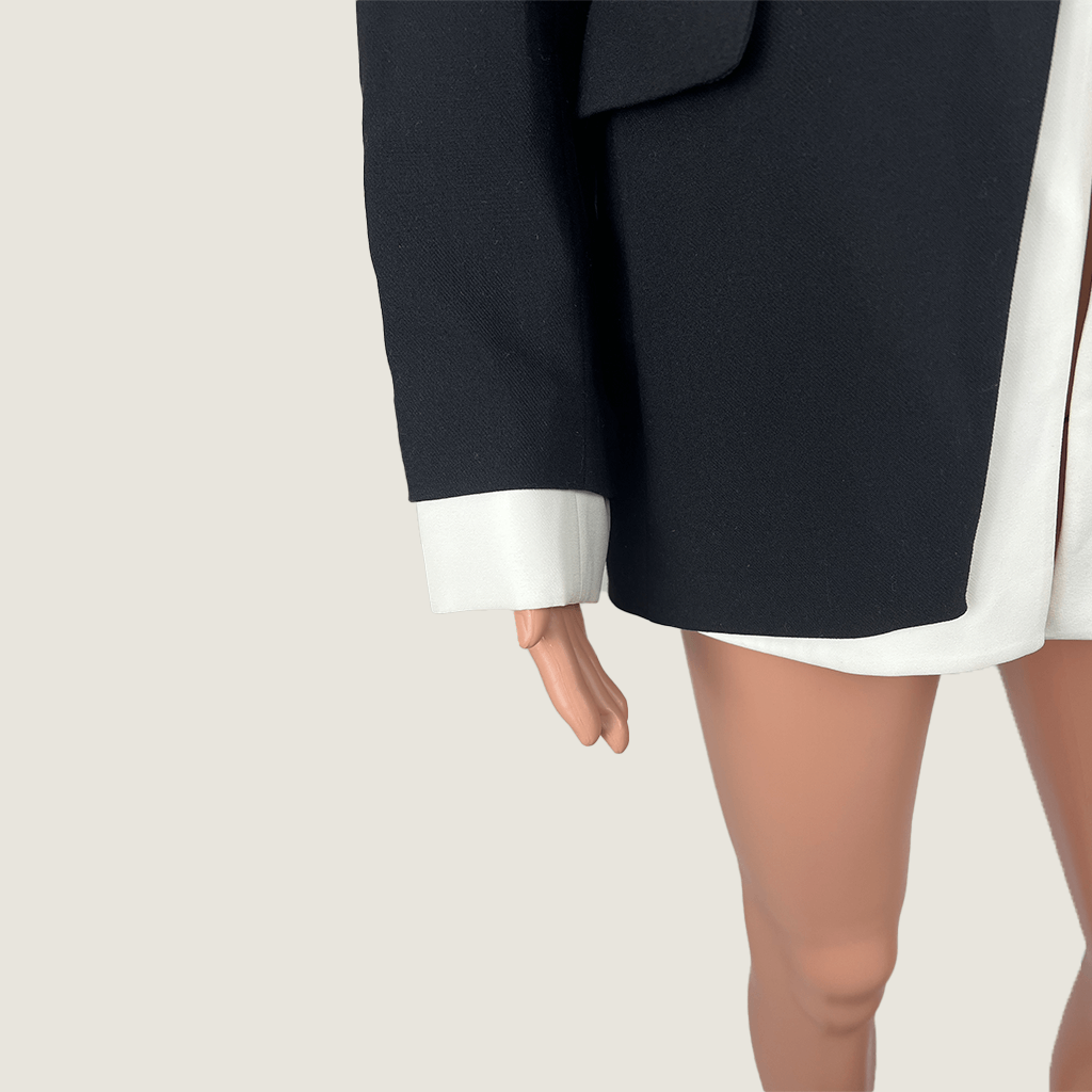 Sleeve detail view of the Decjuba Black With White Jacket