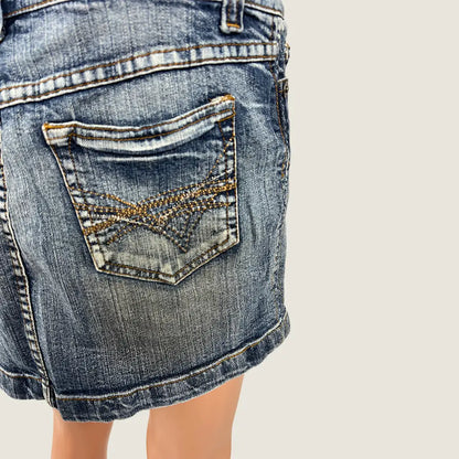 Back Detail View of the Denim Distressed Mini Skirt 