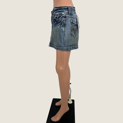 Side View of the Denim Distressed Mini Skirt 