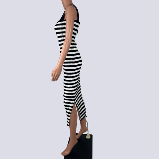 Side view of the Ebby and I Black and White Stripped Knit Dress