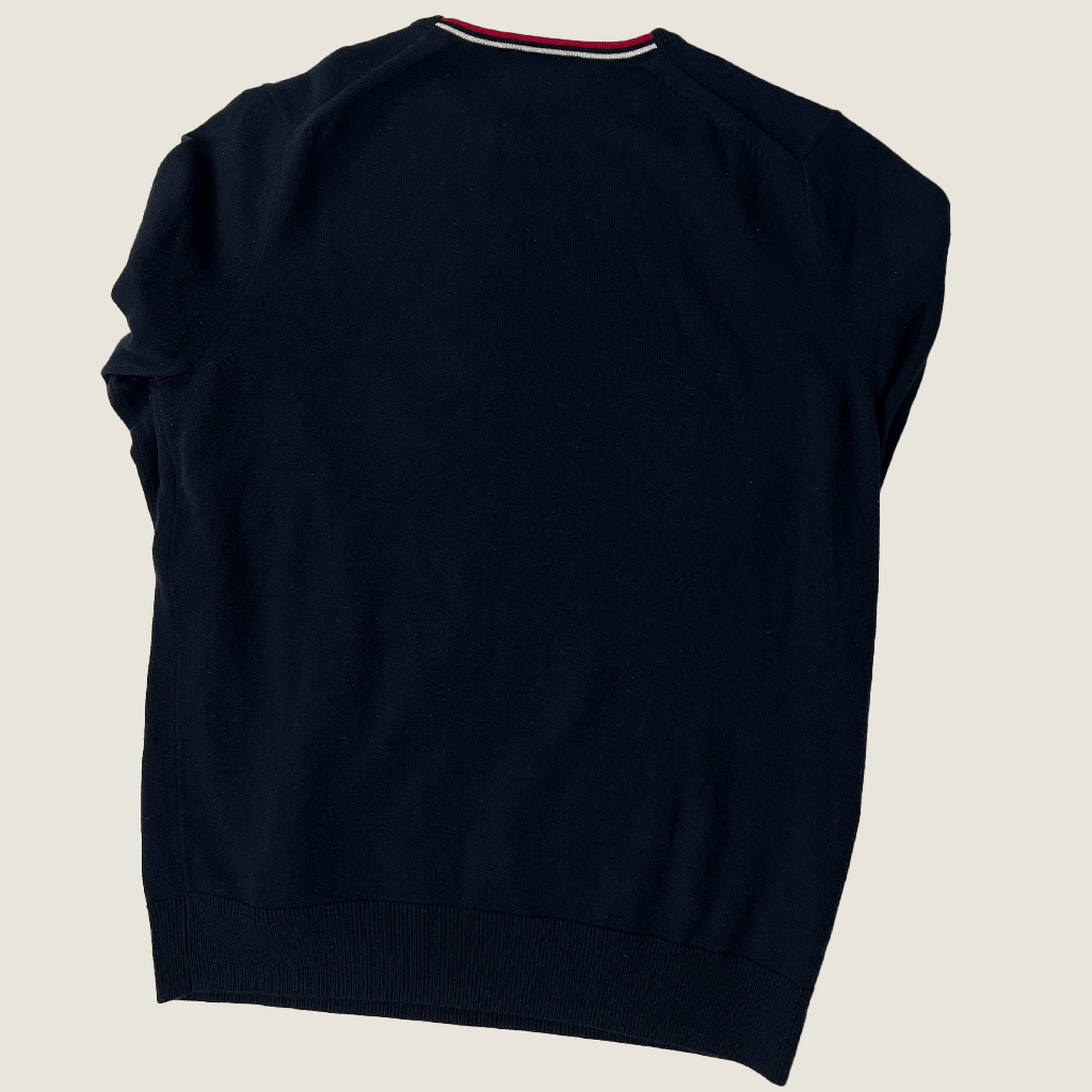 Back view of the Fred Perry black classic knit top