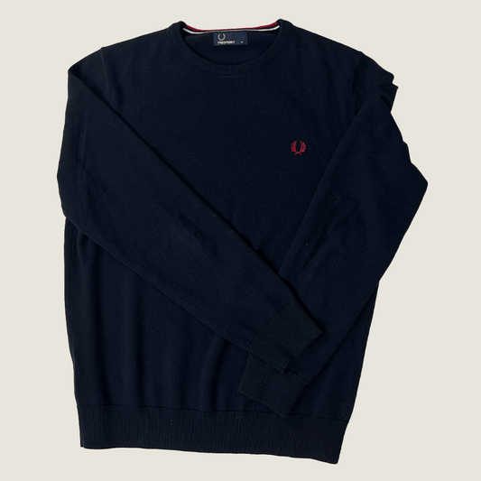 Front view of the Fred Perry black classic knit top