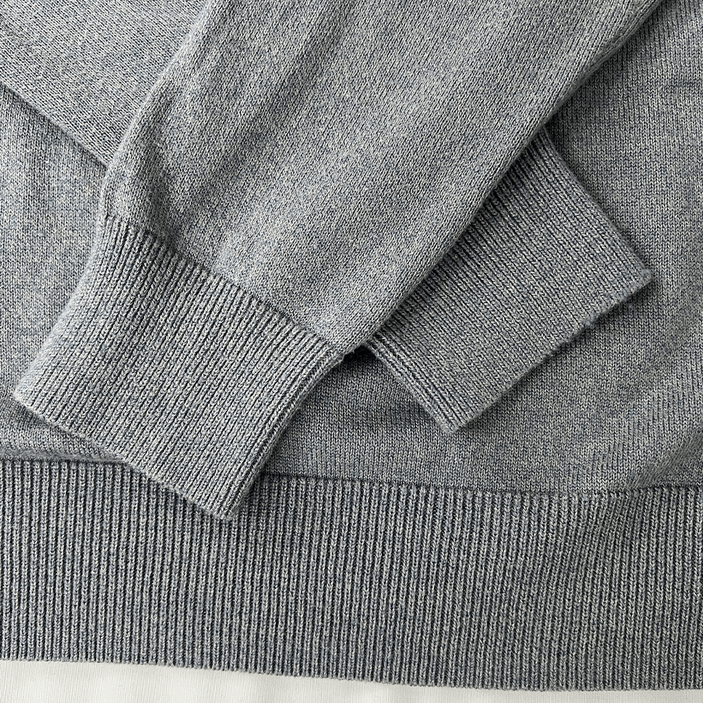 Sleeve detail view of the Fred Perry Knit Tennis V-Neck Jumper Cuff details