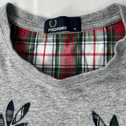 Front collar detail view of The Fred Perry Men's Grey Logo T-Shirt