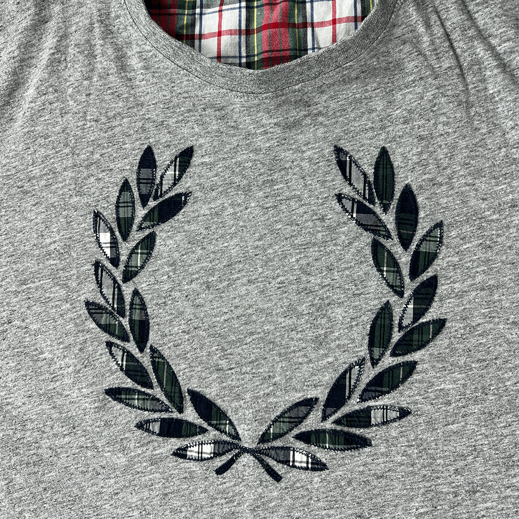 Front detail view of The Fred Perry Men's Grey Logo T-Shirt