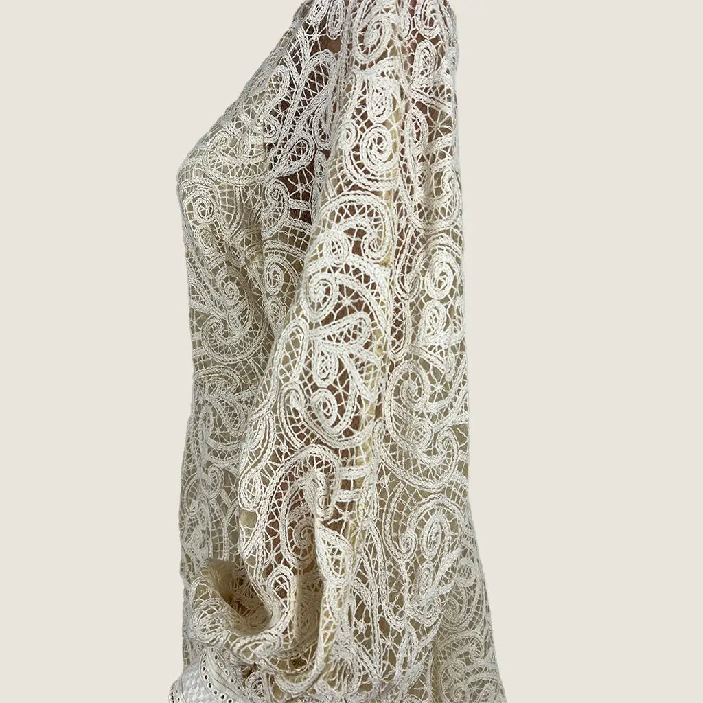 Side detail view of the GDS Estella Lace Midi Long Sleeve Dress