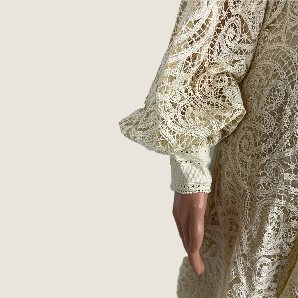 Front cuff detail view of the GDS Estella Lace Midi Long Sleeve Dress