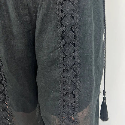 Side Detail View of the GDS Heather Lace Linen Pants in Black