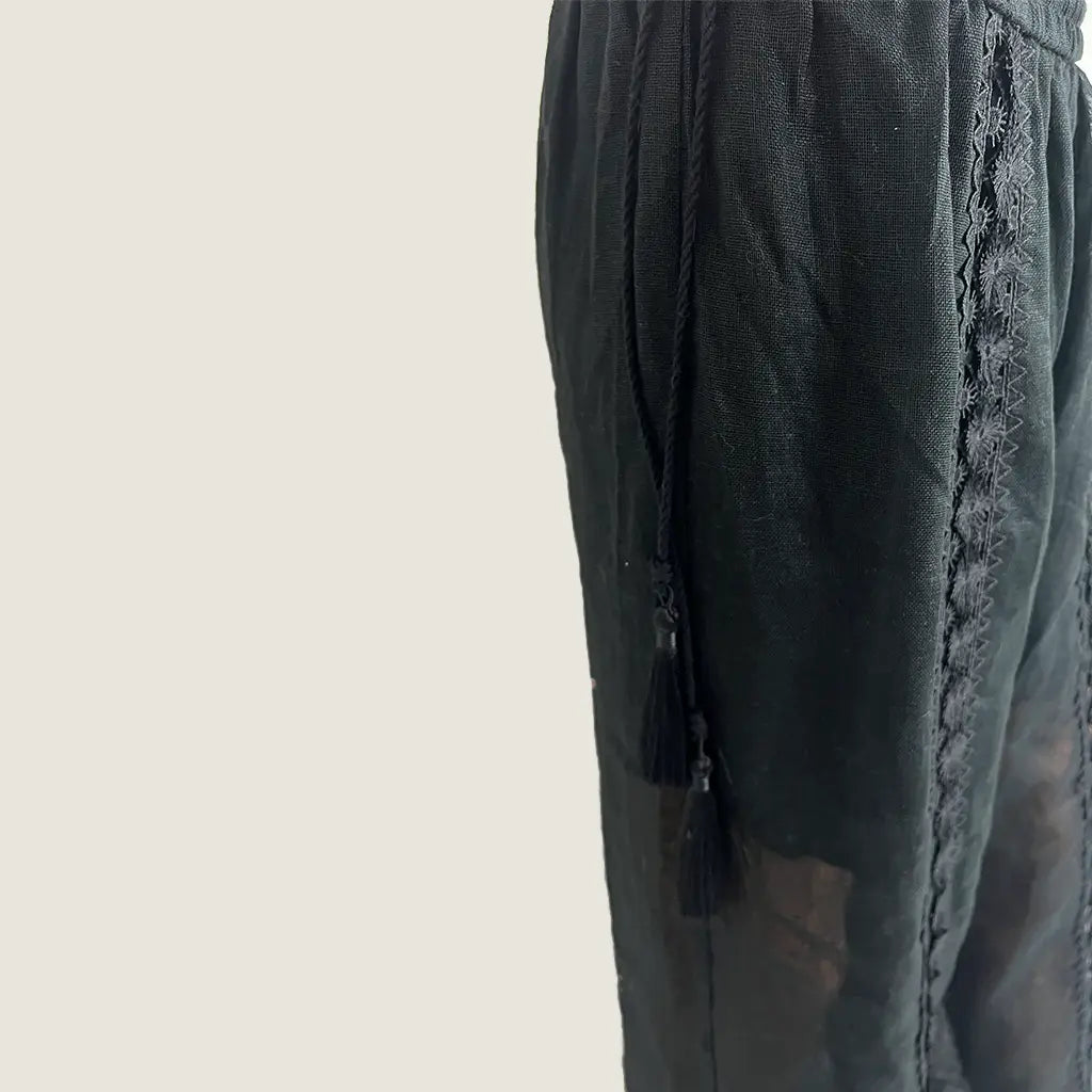 Front Detail View of the GDS Heather Lace Linen Pants in Black