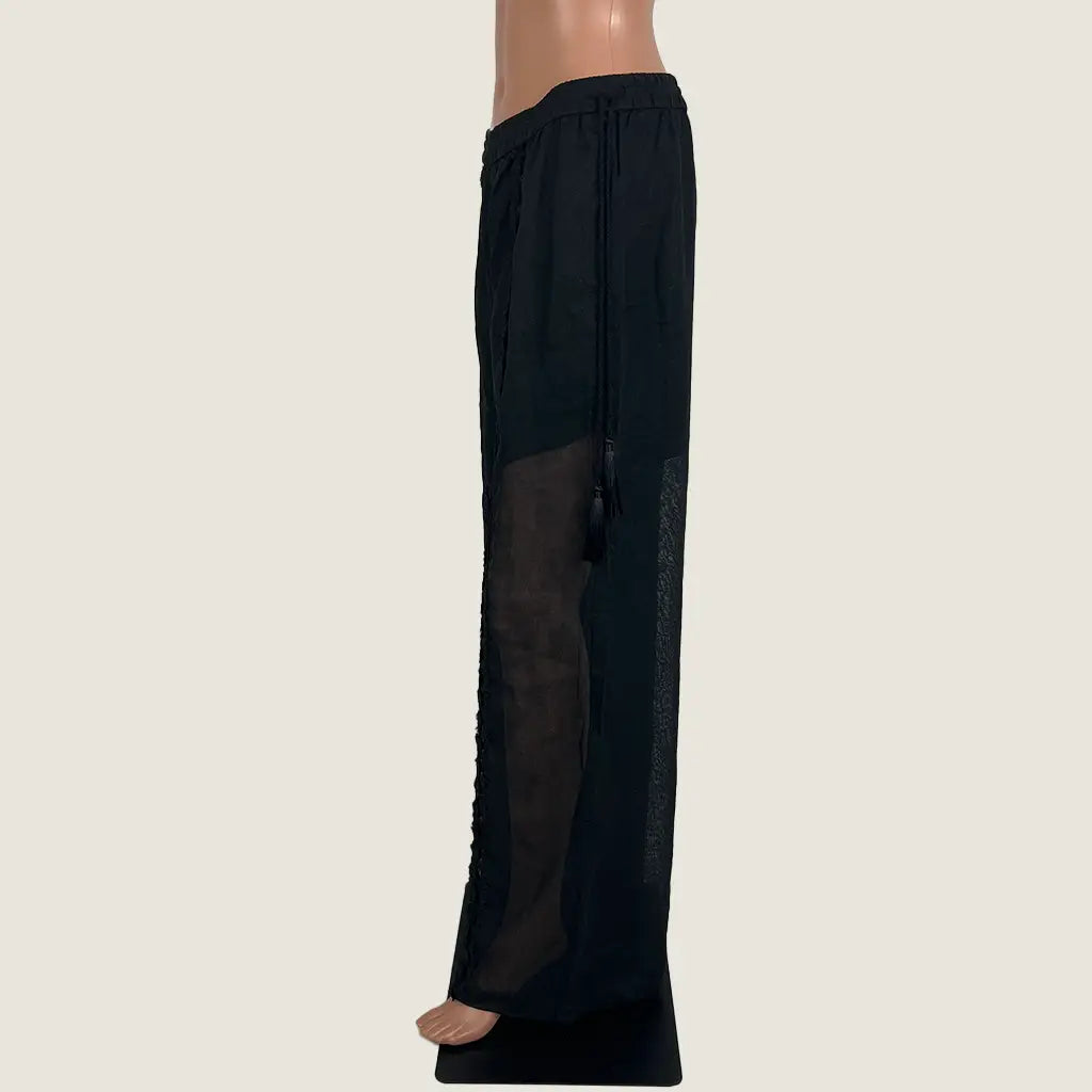 Side View of the GDS Heather Lace Linen Pants in Black