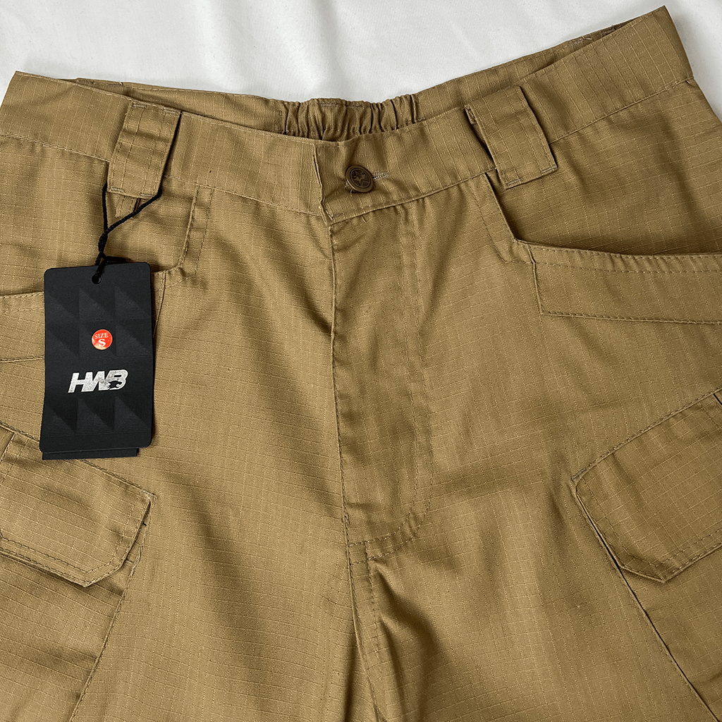 Side close up view of the waiste on the HWB men's khaki cargo short