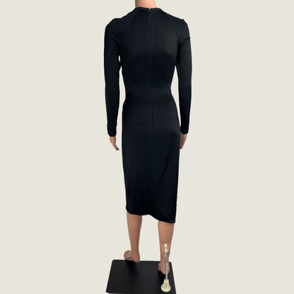 Back view of the Josh Goot black midi knit long sleeve dress