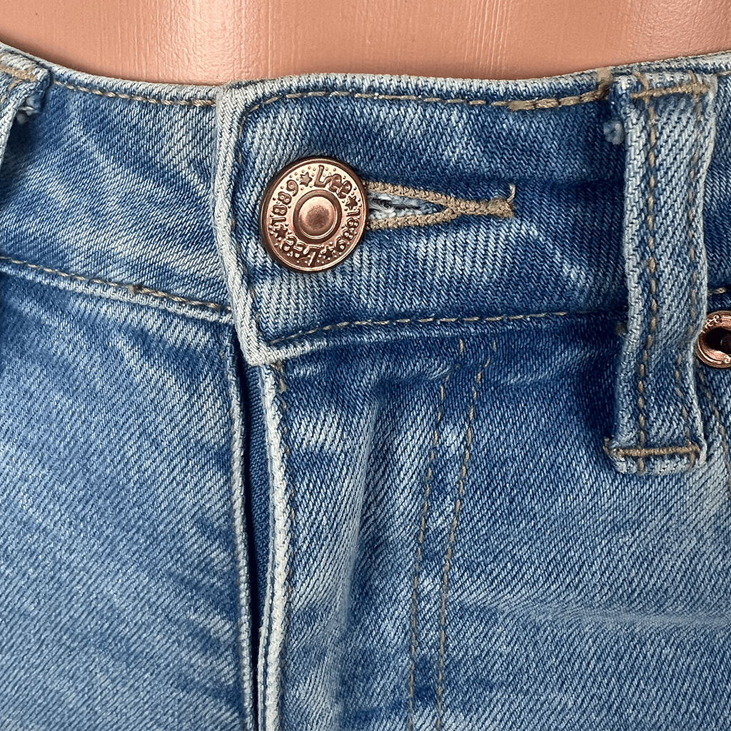 Side Close Up View of Button on the Lee High Licks Crop Denim Jeans