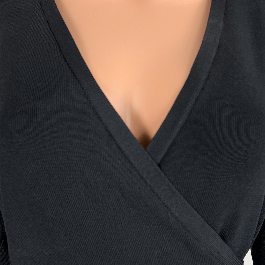 Front View of the V Neckline on the Legoe Black Knit Wrap Midi Dress