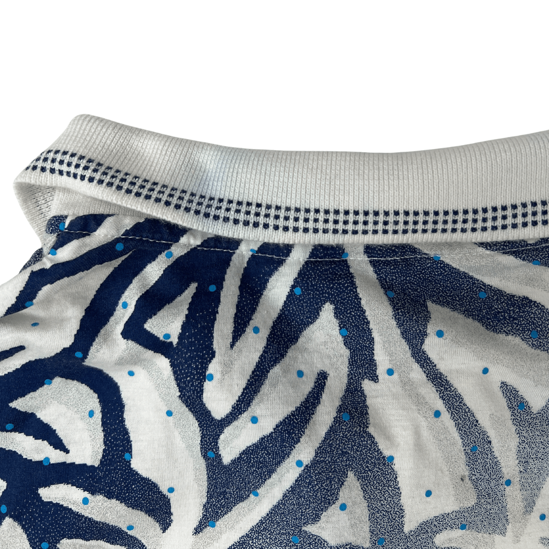 Front view of the Lotto White & Blue Polo Shirt