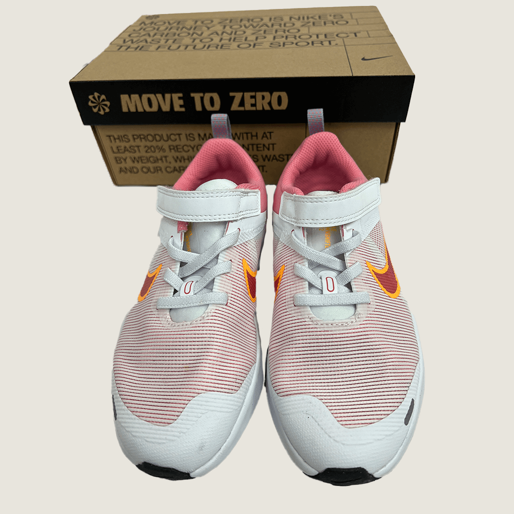 Front view of the Nike Downshifter shoes with box