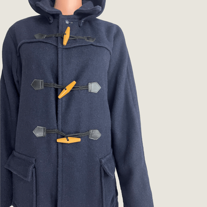 Front view of the buttons on the Norwellan Bluey Junior Showerproof Dark Blue Duffel Coat