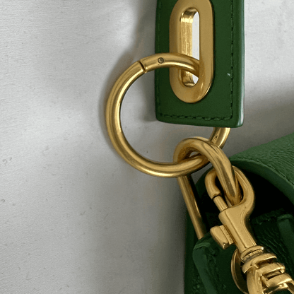 Brass links Close Up View of the Oroton Green Leather Handbag