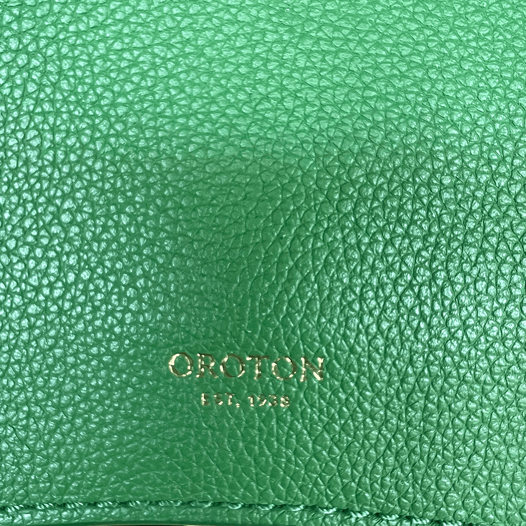 Close up View of the Oroton Green Leather Handbag Front Logo