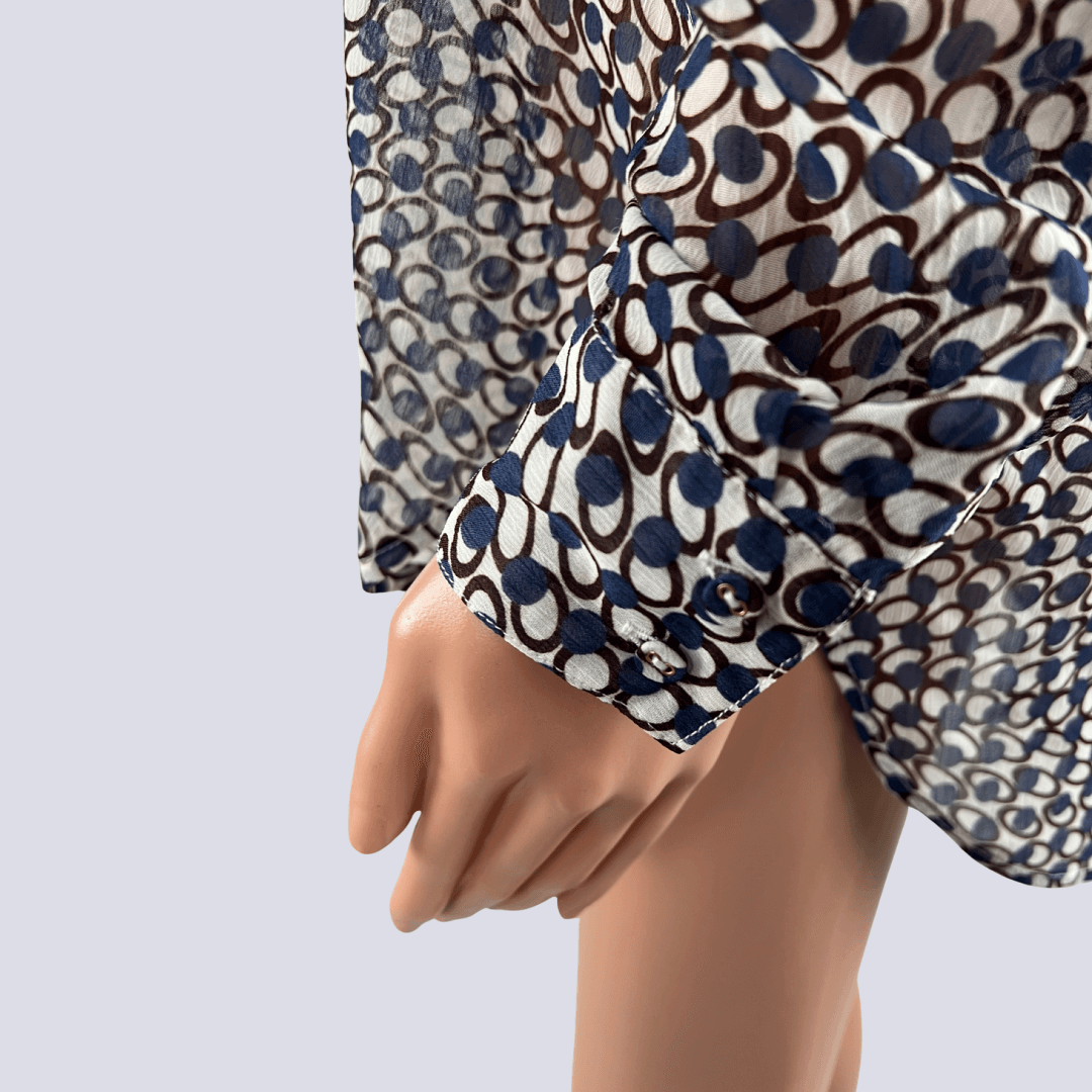 Side detail view of the Preview sheer shirt