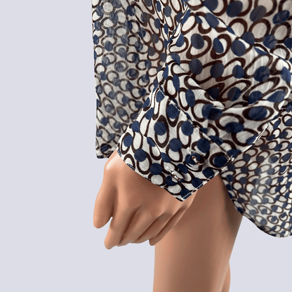 Side detail view of the Preview sheer shirt