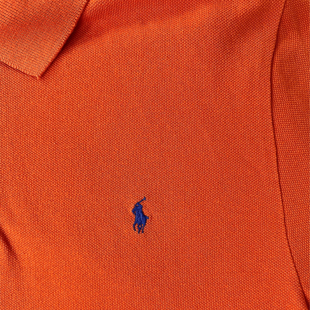 Front logo detail of the orange Ralph Lauren Short Sleeve Men's Polo 