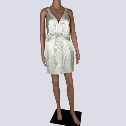 Front view of the Seduce silk cream mini dress