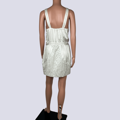 Back view of the Seduce silk cream mini dress