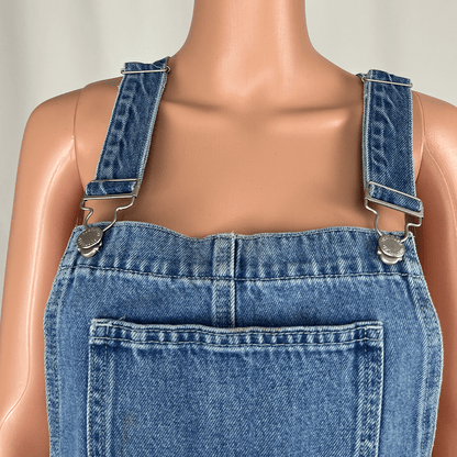 Front close up view of the Subtitled Women's Denim Mini Overall Pinafore