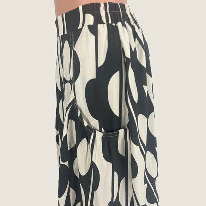 Side Detail View of the Sunny Girl Linen Blend Midi Skirt in Black