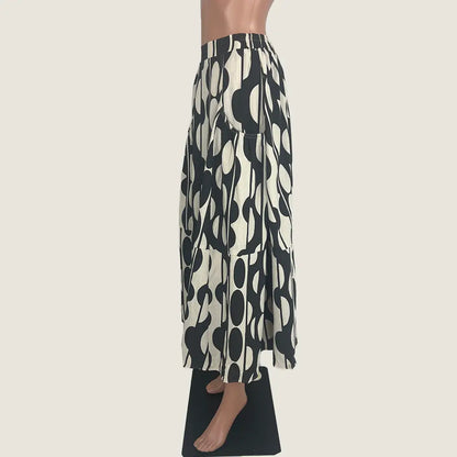 Side View of the Sunny Girl Linen Blend Midi Skirt in Black