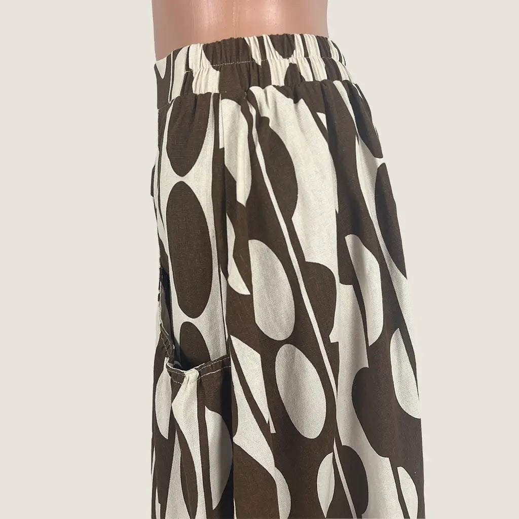 Side Detail View of the Sunny Girl Linen Blend Midi Skirt in Brown